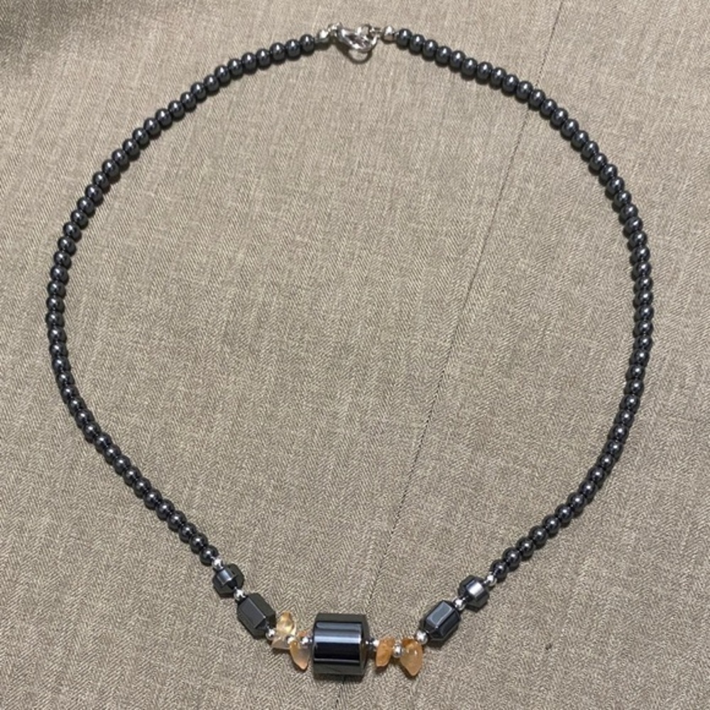 Vintage Beaded hematite necklace with amber-colored stones.